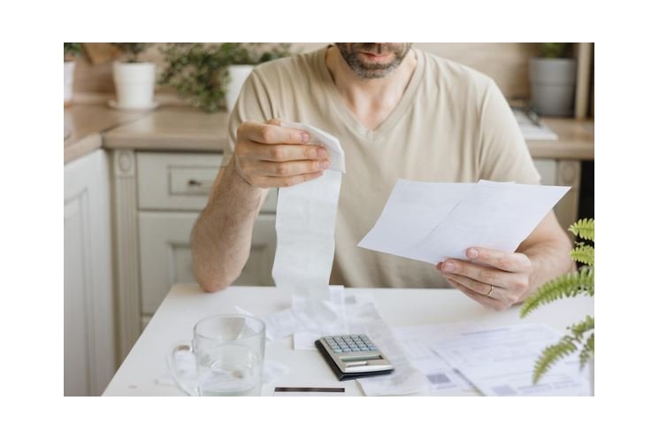 man-pays-bills-utilities-counts-amount-expenses-income-calculator-financial-literacy-mortg