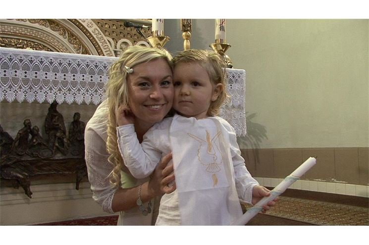 Zpěvačka a moderátorka Luďka Kuralová po křtu se synem Kristiánkem 