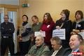 Proti volbě Václava Šlajse hejtmanem protestovaly zhruba dvě desítky lidí. 